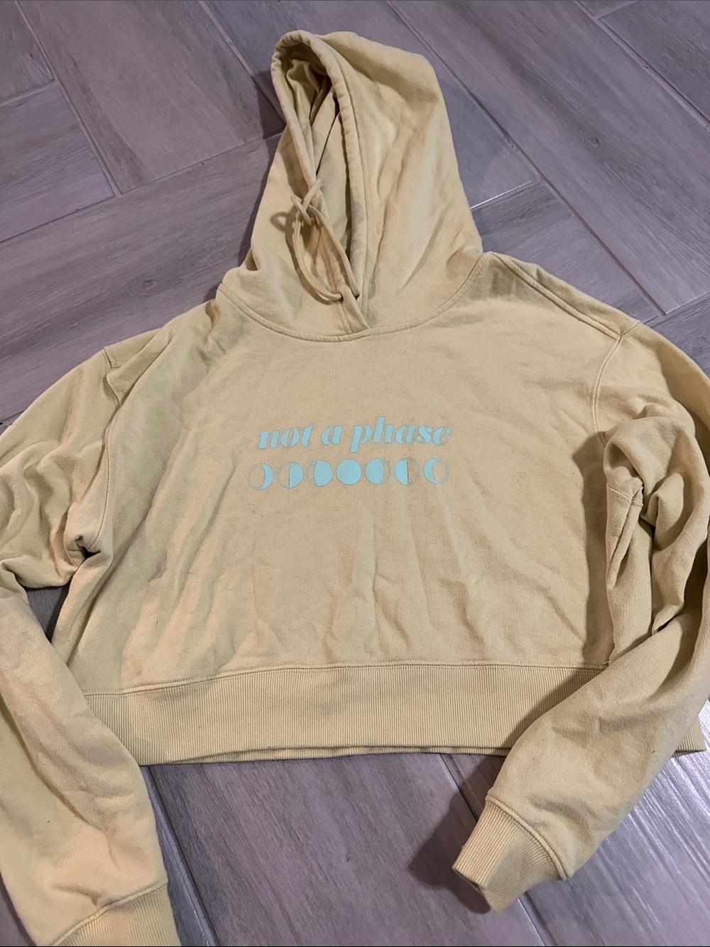 Women’s Cropped Hoodie with 'Not a Phase' Moon Graphic - Yellow